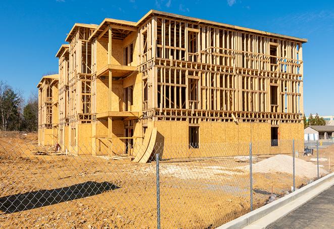 temporary fencing enclosing a construction site for privacy and protection in Edgerton, WI